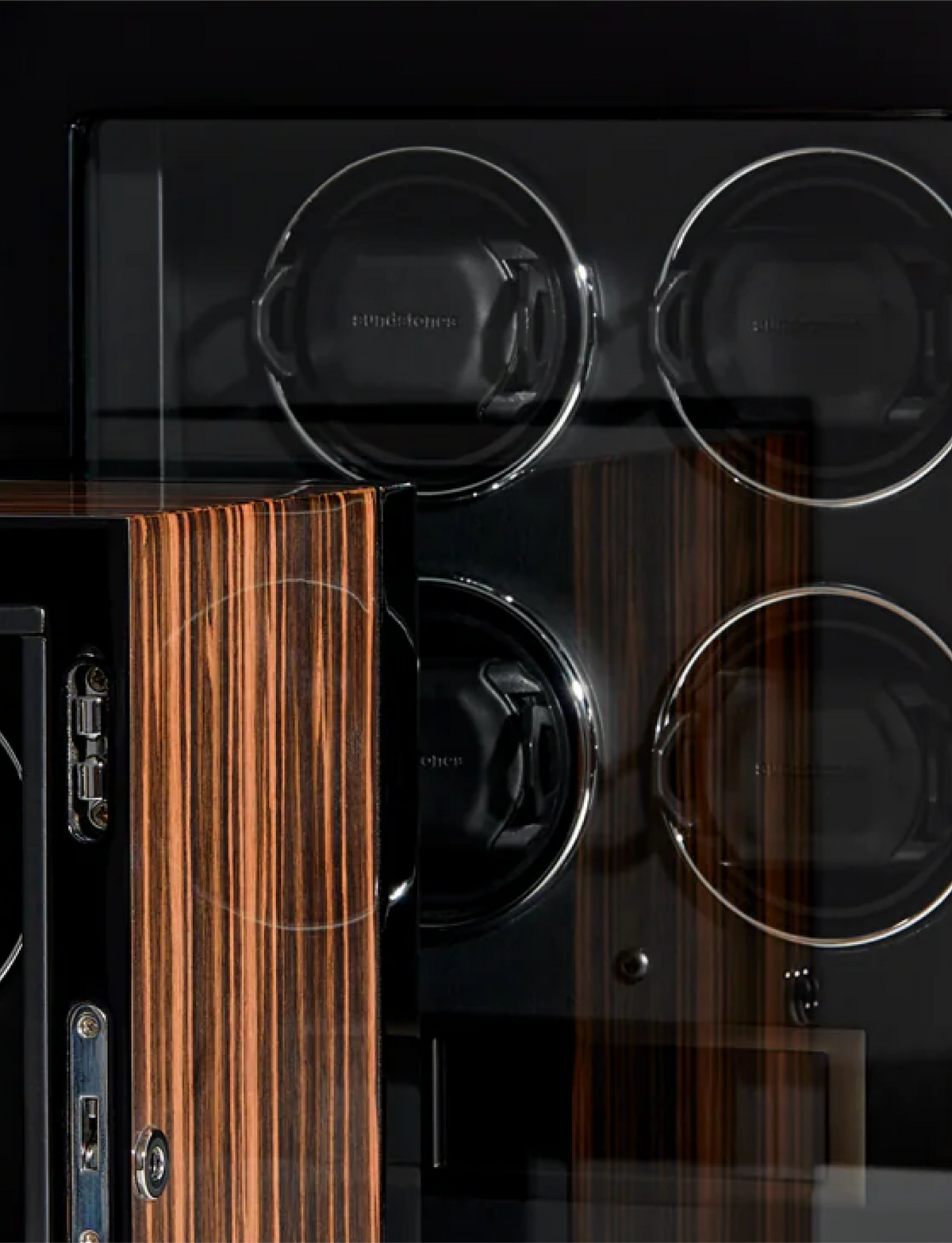 
Detail of Opulence watch winders with watch holders and rosewood-finish cases